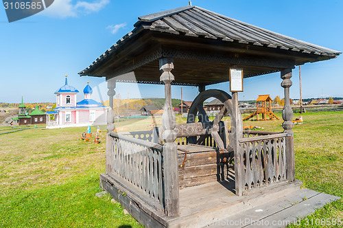 Image of Old wooden water well in village