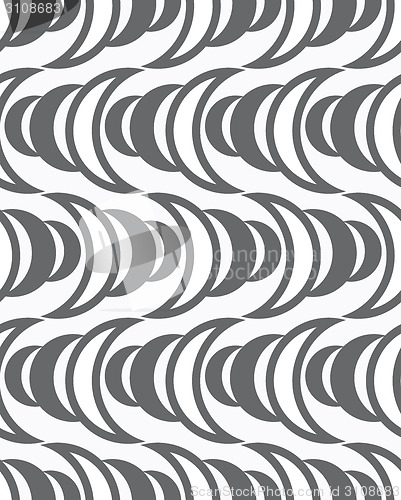 Image of Repeating ornament of  gray half-circles making waves