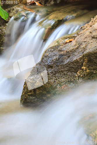 Image of Small waterfall in a garden