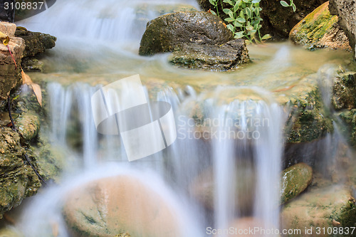 Image of Small waterfall in a garden
