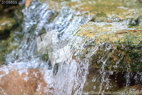 Image of Small waterfall in a garden