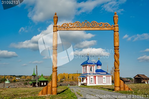 Image of Wooden gate and Rise chapel. Russia