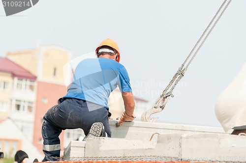 Image of Builder working on residental house construction