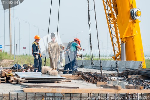 Image of Workers on bridge construction