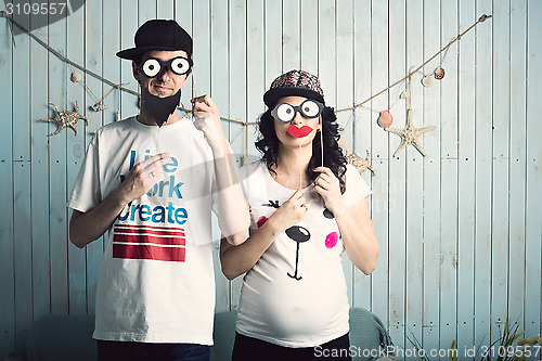 Image of Funny couple waiting for children