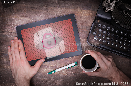 Image of Tablet on a desk, concept of data protection