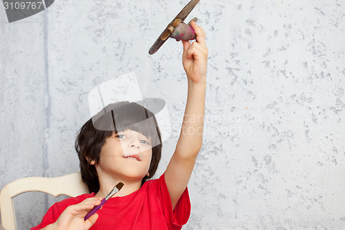 Image of boy and plane