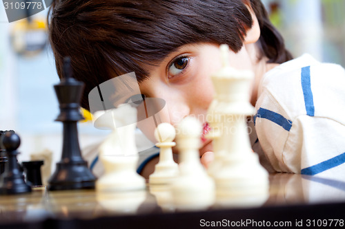 Image of boy and chess