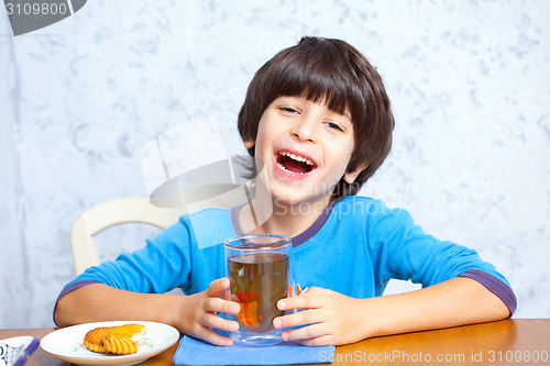 Image of boy having fun laughing