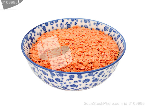 Image of Red lentils in a blue and white china bowl