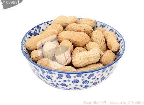 Image of Monkey nuts in a blue and white china bowl