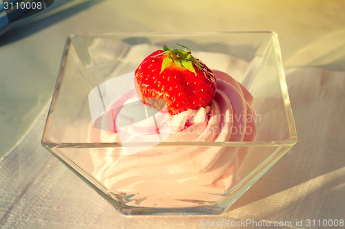 Image of Dessert: cream soufflé and strawberries.
