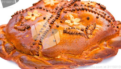 Image of Beautiful cake on a white towel. Sold at the fair.