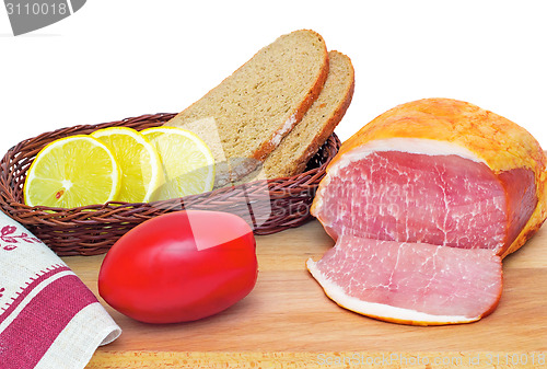 Image of Ham , bread and vegetables on a white background.