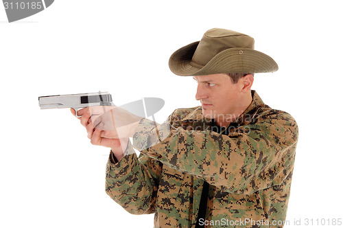 Image of Soldier pointing a pistol.