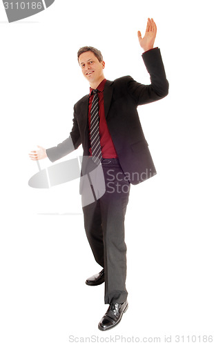 Image of Happy dancing businessman.