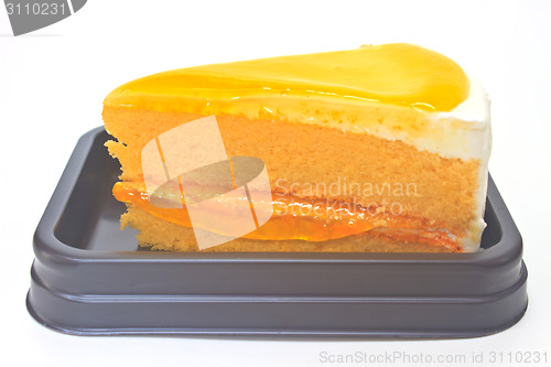 Image of  Orange Cheesecake in plate on background