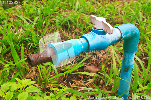 Image of old and rusty faucet 