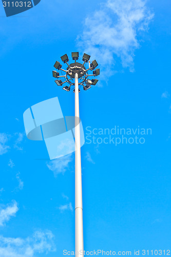 Image of sportlight on blue sky background 