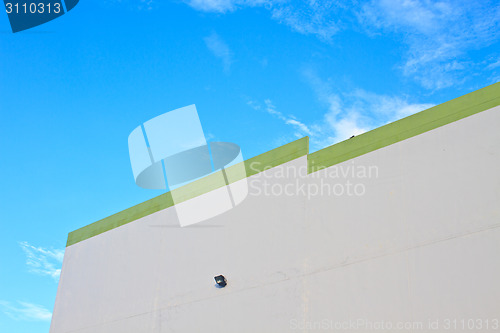 Image of Building concrete wall with blue sky