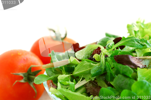 Image of Baby greens and tomatoes