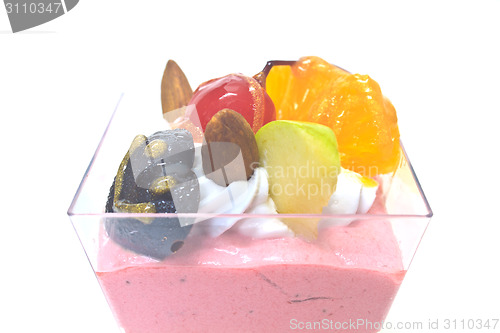 Image of cupcake with cream and fruits