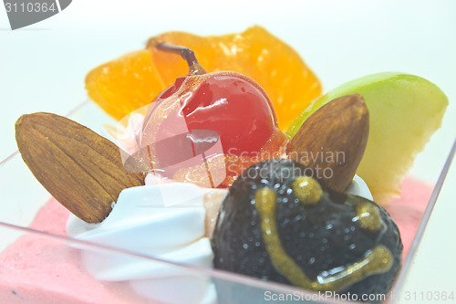 Image of cupcake with cream and fruits