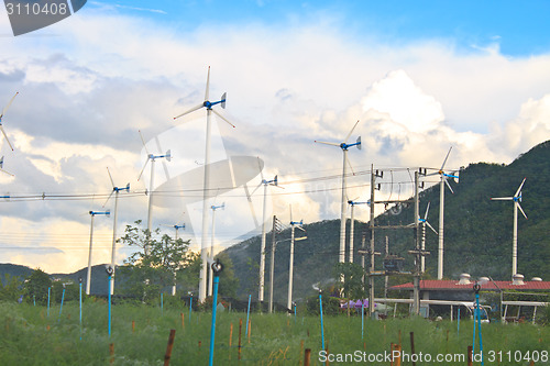 Image of Wind turbines on a farm