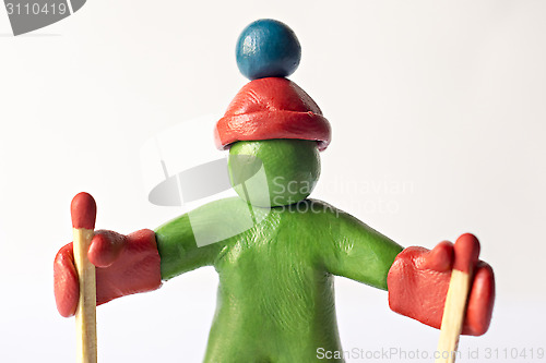 Image of Green skier from plasticine 