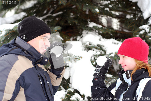 Image of Family with snowballs