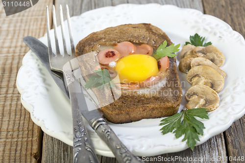 Image of Plate with fried eggs.