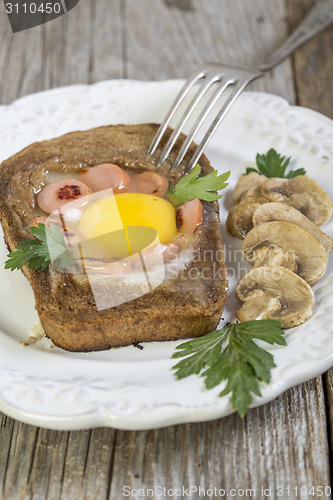Image of Scrambled eggs with sausage.