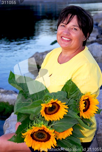 Image of Woman sunflowers