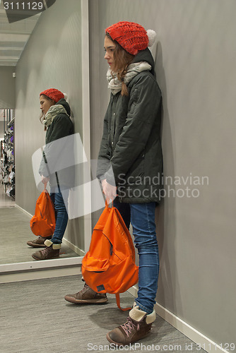 Image of Girl and reflection.