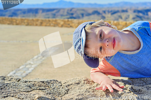 Image of Little boy watching on you