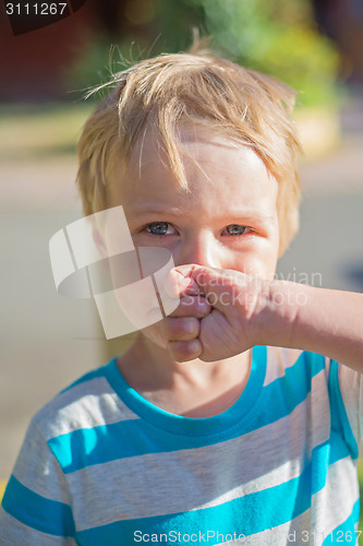 Image of Unhappy little boy