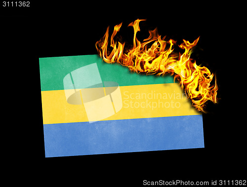 Image of Flag burning - Gabon