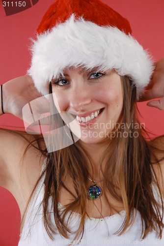 Image of Young woman in a Santa hat