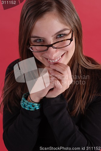 Image of Young woman in glasses smiling
