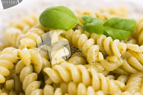 Image of italian fusilli pasta and fresh homemade pesto sauce 