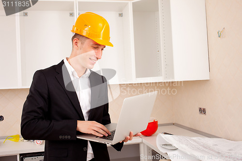 Image of Engineer calculates estimates for repair