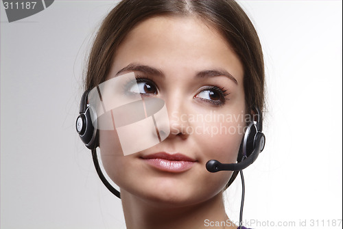 Image of young woman with head set