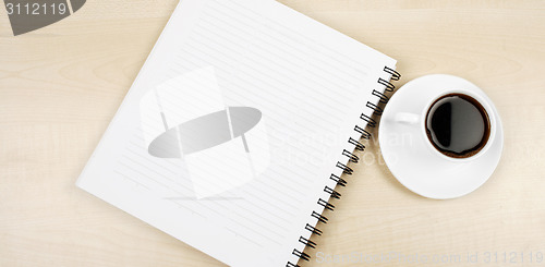 Image of White cup and white page