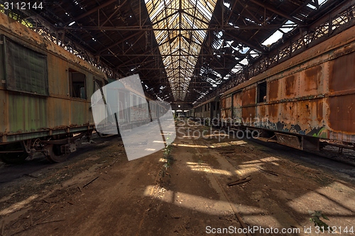 Image of Cargo trains in old train depot