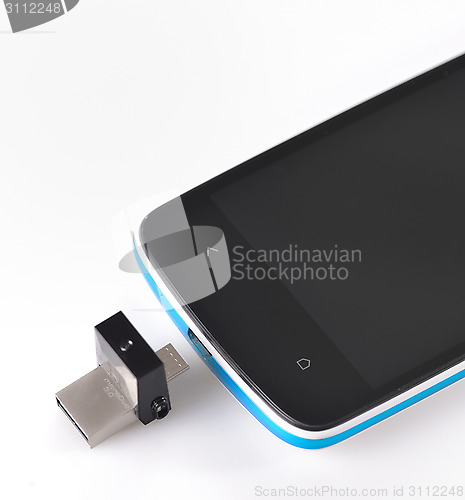 Image of USB flashes drive 3.0 and mobile phone