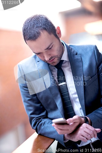 Image of business man at the office