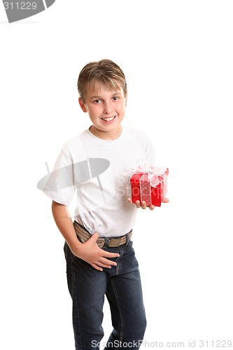 Image of Child holding Christmas gift