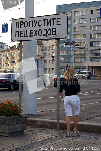 Image of Woman on sidewalk