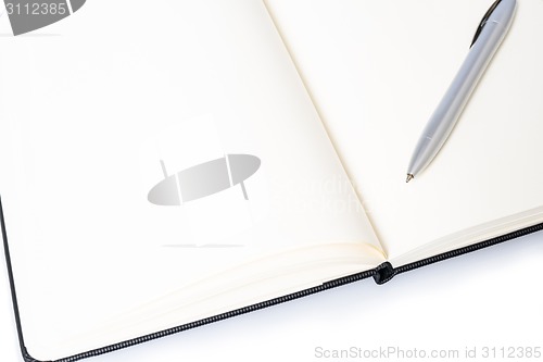 Image of Open notebook with pen and space for your text