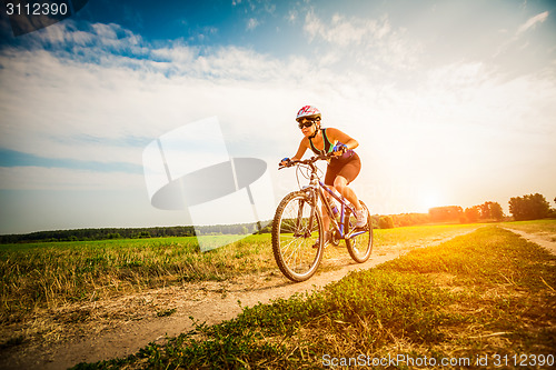 Image of Women on bike